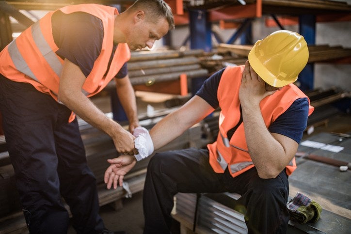 Men in safety vests highlighting a construction accident attorney in Riverside, CA